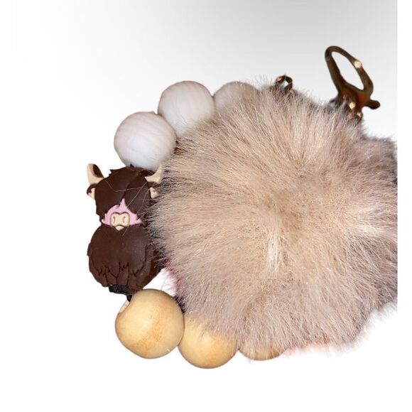 🎀2/$20🎀 Brown and Blue Highland Cow Keychain Wristlet with Pom Pom - Picture 2 of 4